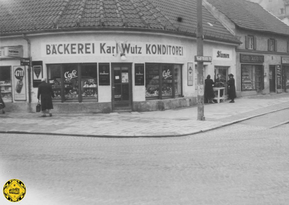 Bild vom März  1951 am Rotkreuzplatz: die Versorgung in der Nachkriegszeit erfolge hauptsächlich aus den Hilfsbauten der Einzelhändler am Rotkreuzplatz.