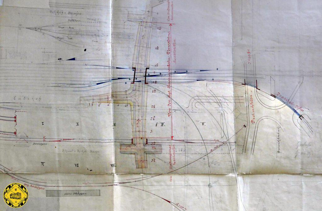 Dieser Plan vom Januar 1892 zeigt, dass nun diese geplante Unterführung an der Thalkirchnerstraße keine 2 Gleise, sondern 5 Gleise zu unterfahren hatte, wobei ein weiteres Gleis von der Stadt für die Belieferung ihrer Lagenhäuser bestimmt war. Die Staatsbahn allerdings finanzierte nur ihre 4 Staatsbahngleise, die Gleise der Zufahrt zu den städtischen Hallen musste der Magistrat planen & zahlen & verabschieden.